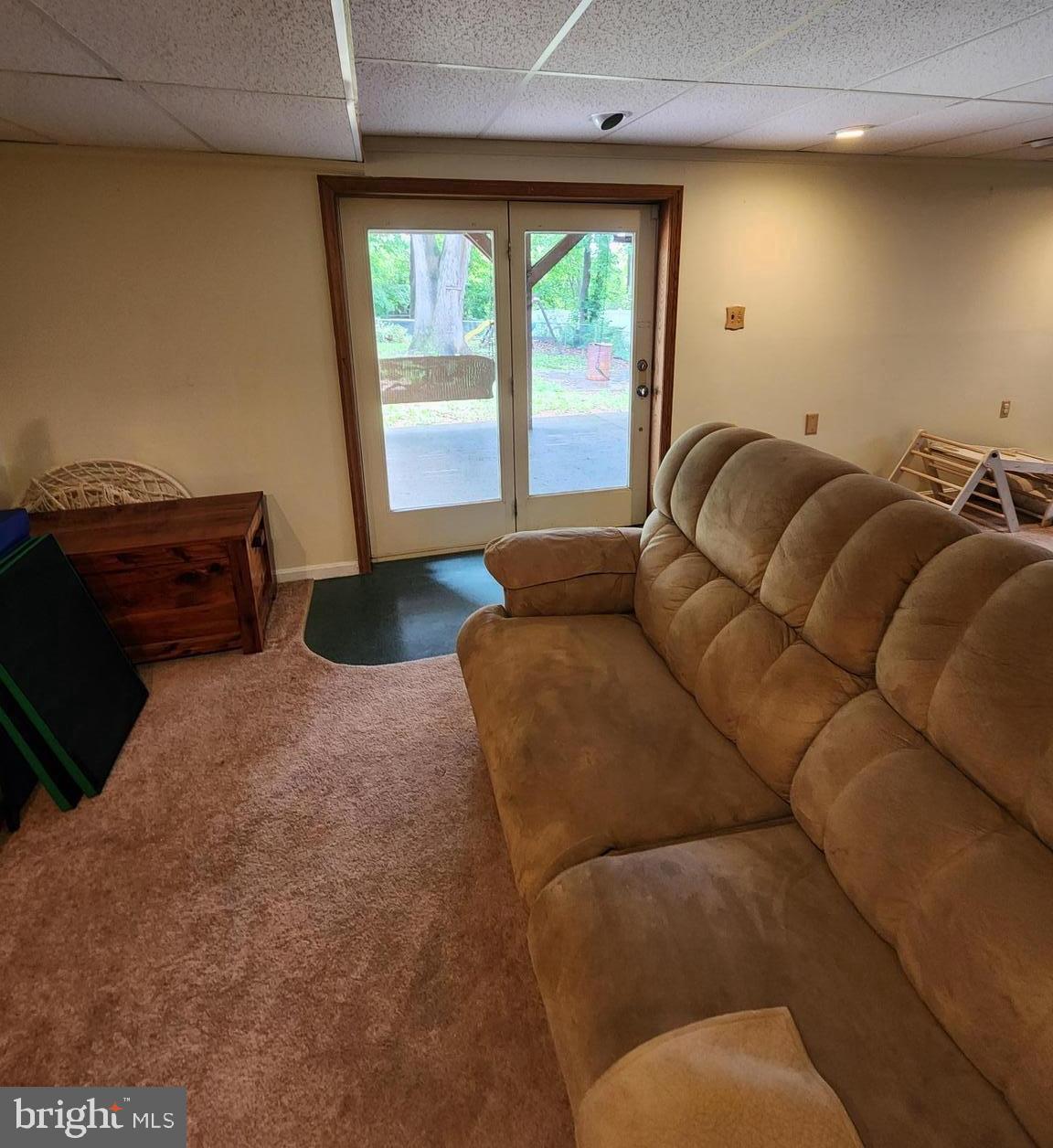 87 Summers Street Inwood, WV 25428 - Photo 33 of 41 a living room with furniture and a large window