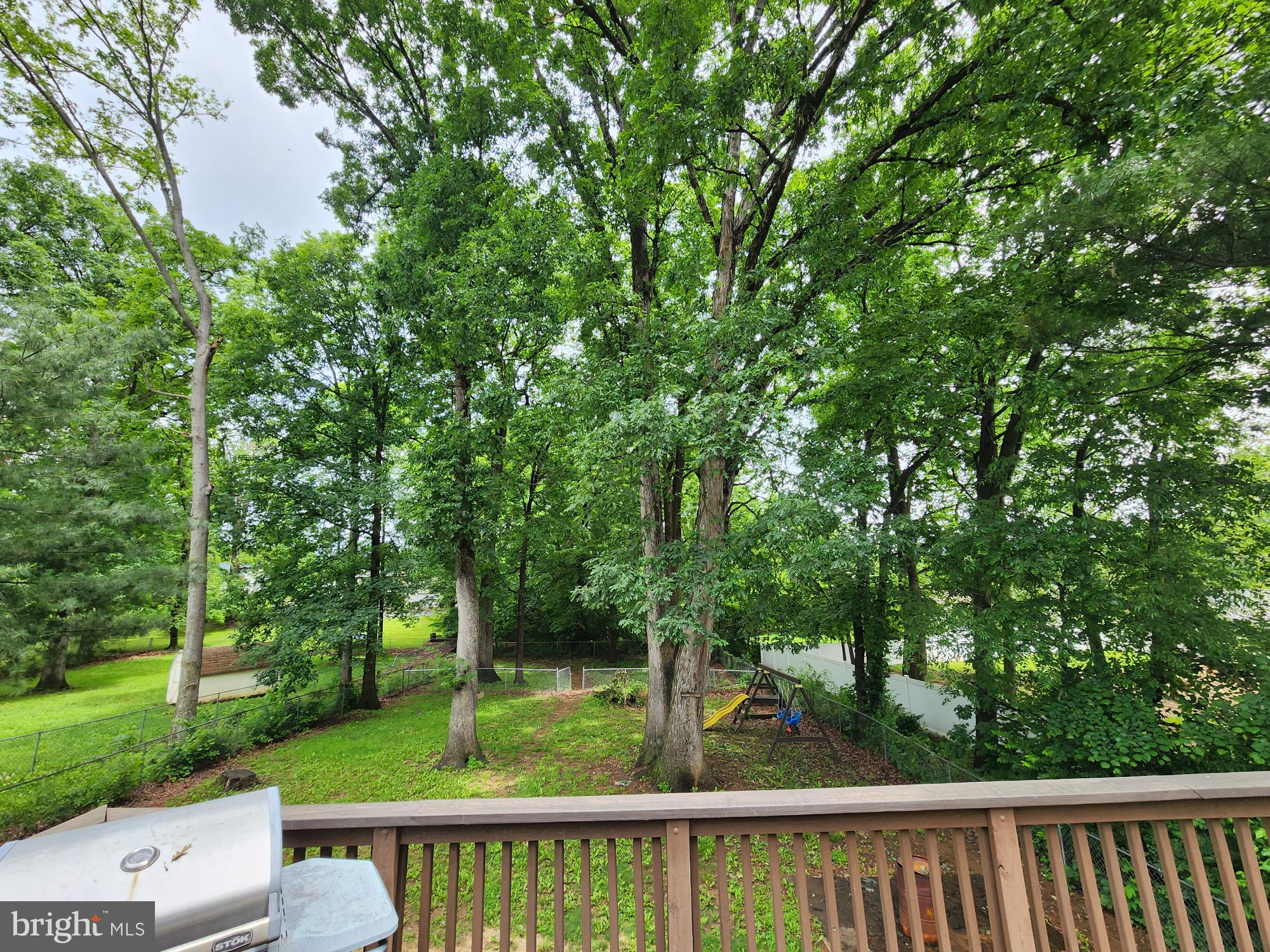 87 Summers Street Inwood, WV 25428 - Photo 37 of 41 a view of a wooden deck and backyard