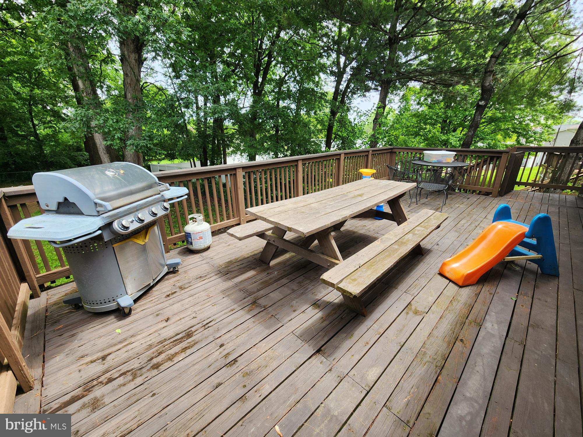 87 Summers Street Inwood, WV 25428 - Photo 41 of 41 a view of roof deck with wooden floor and seating space