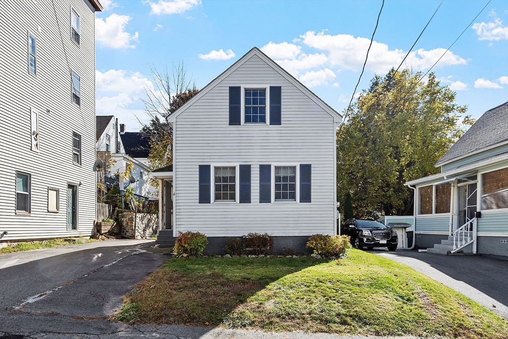 a view of backyard of a house