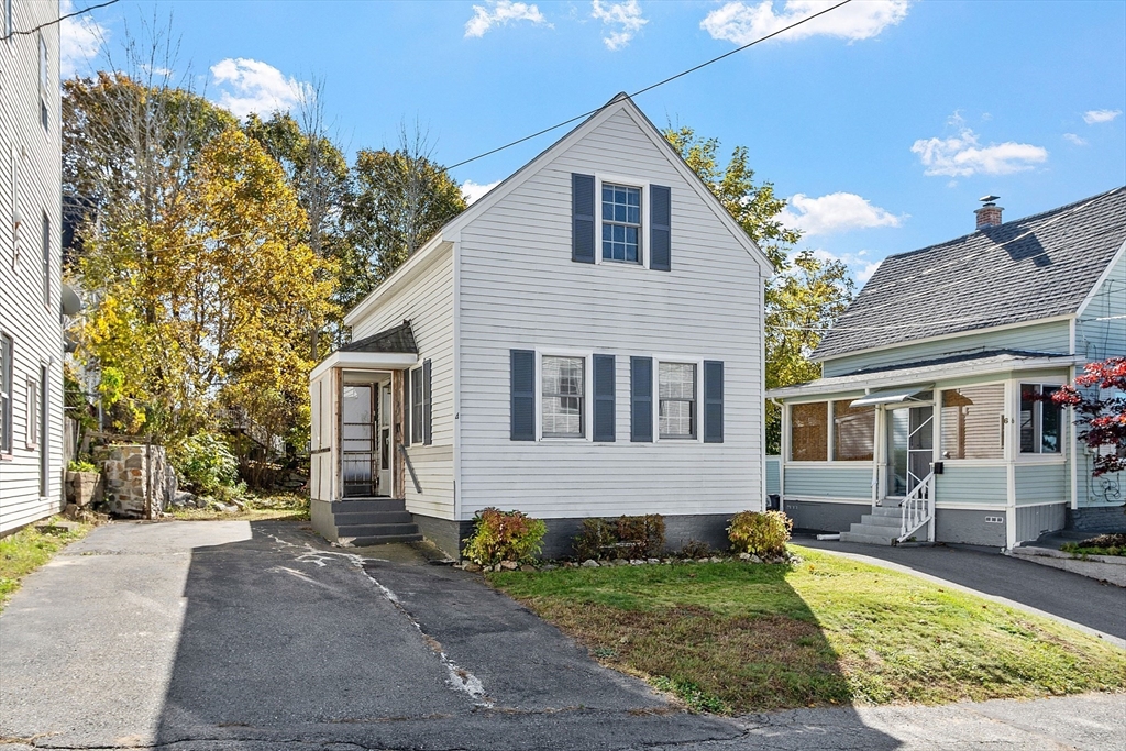 4 Moran Street Gardner, MA 01440 - Photo 2 of 30 a front view of a house with a yard