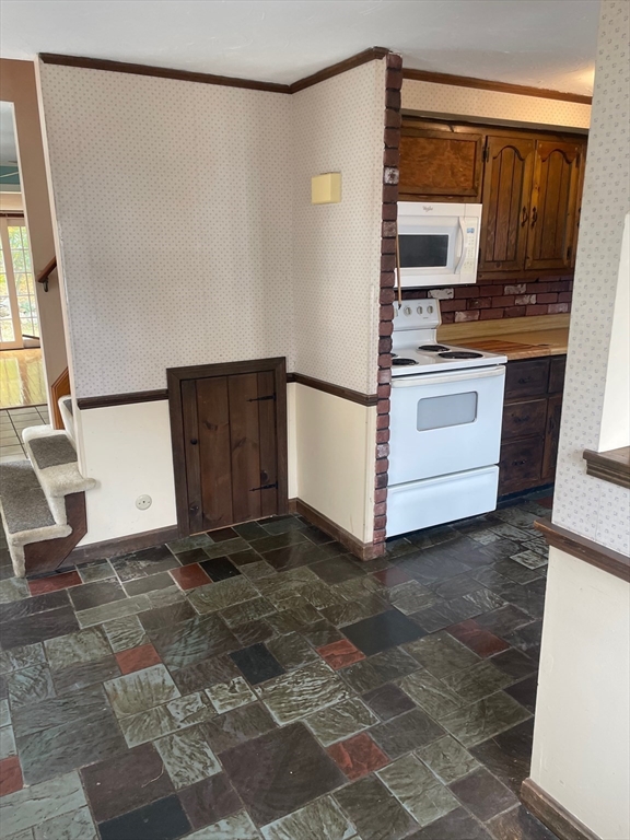 4 Moran Street Gardner, MA 01440 - Photo 21 of 30 a view of kitchen with stainless steel appliances cabinets and a window