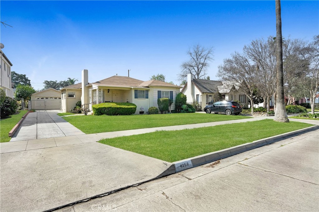 4258 Merrill Avenue Riverside, CA 92506 - Photo 1 of 1 a front view of building with yard