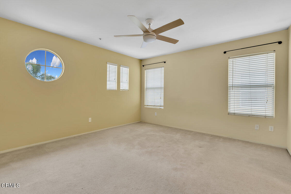 825 Noontide Way Oxnard, CA 93035 - Photo 14 of 26 a view of an empty room with a window