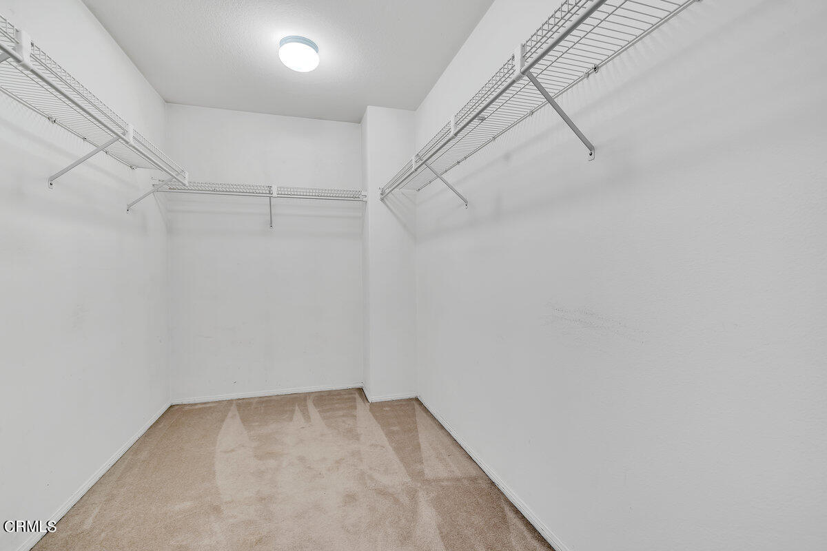 825 Noontide Way Oxnard, CA 93035 - Photo 17 of 26 a view of a room with racks on the wall