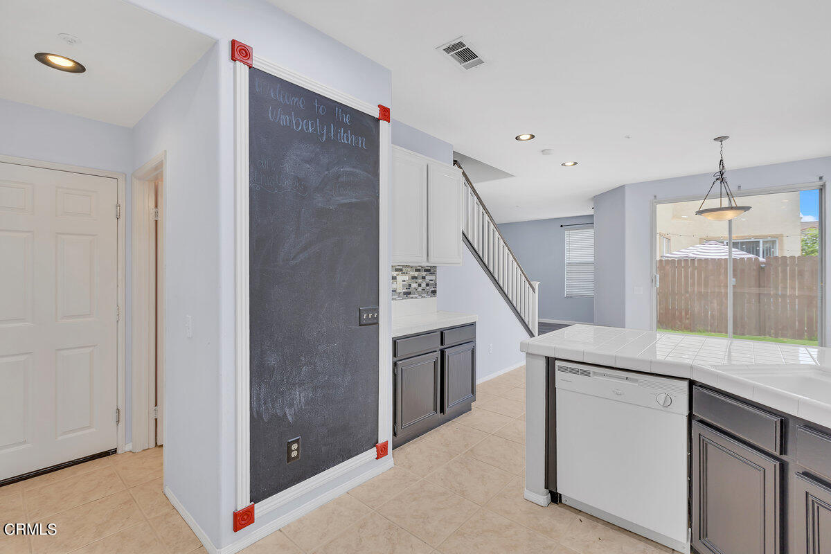 825 Noontide Way Oxnard, CA 93035 - Photo 10 of 26 a view of hallway with washer and dryer