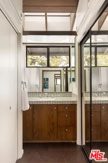 a kitchen with stainless steel appliances granite countertop a stove and a refrigerator