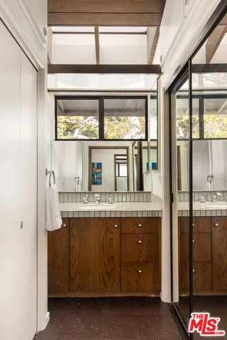 a kitchen with stainless steel appliances granite countertop a stove and a refrigerator