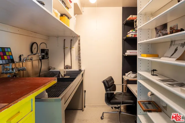 a room with a desk and chair