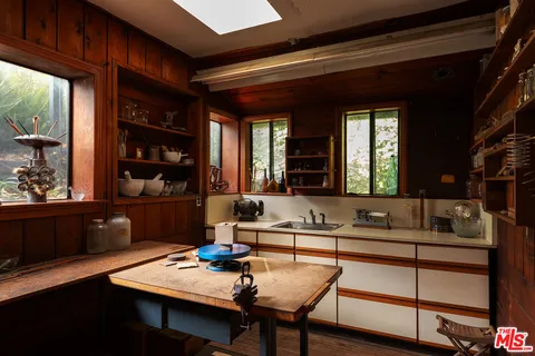 a view of a dining room with furniture and window