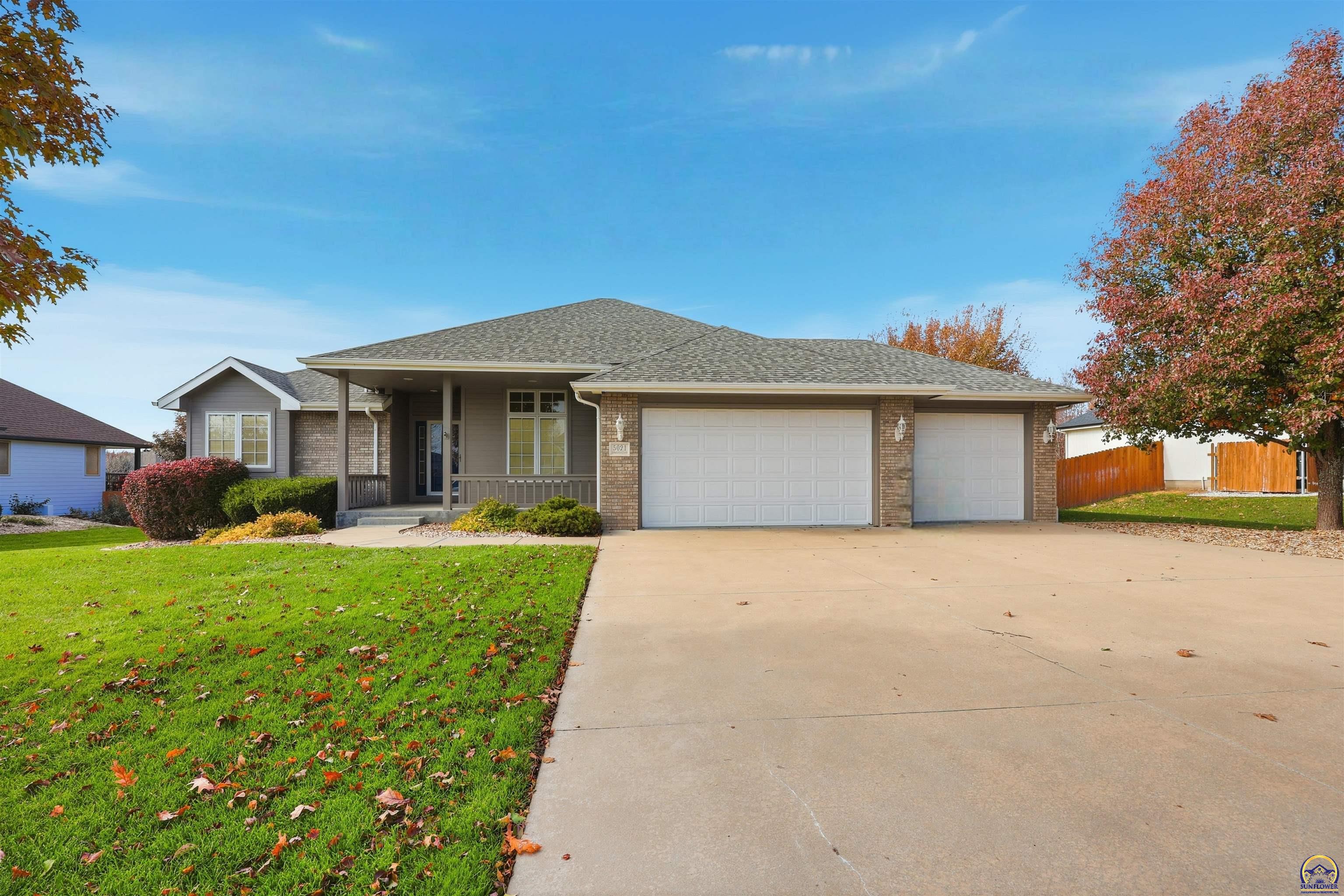 5021 Northwest Sterling Chase Drive Topeka, KS 66618 - Photo 1 of 40