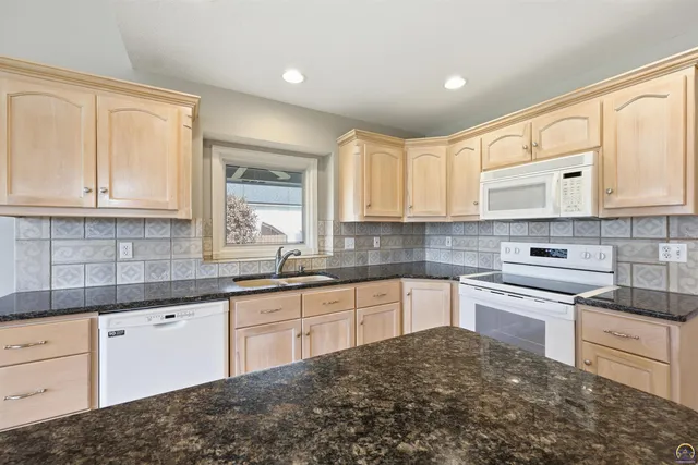 $440,000 | 5021 Northwest Sterling Chase Drive, Topeka, KS 66618