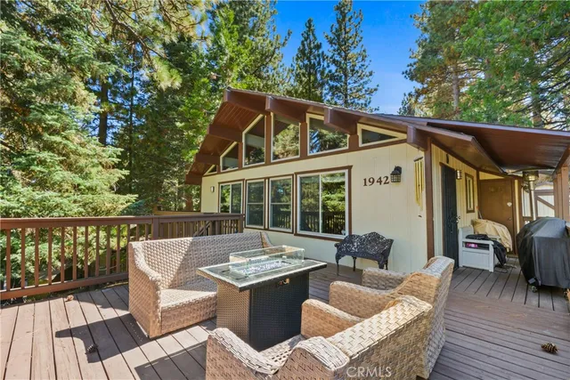 a view of house with outdoor seating space