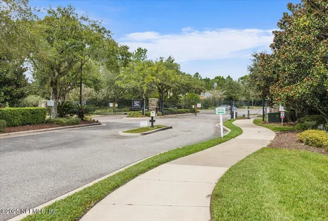 a view of a park with swings and slides