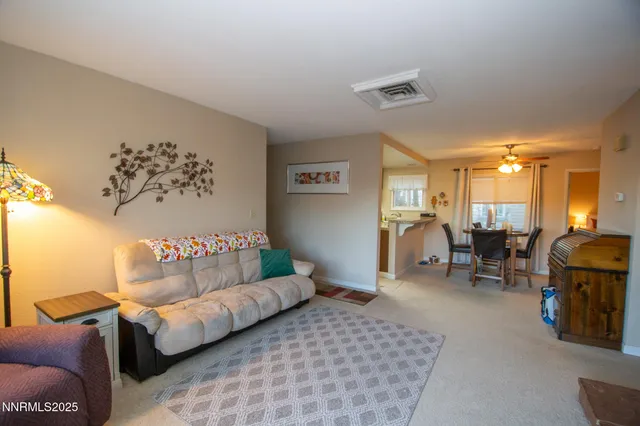 a living room with furniture and a couch