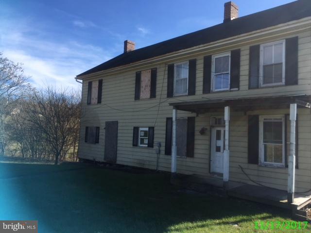 20725 Reno Monument Road Boonsboro, MD 21713 - Photo 1 of 1 a front view of a house with a yard