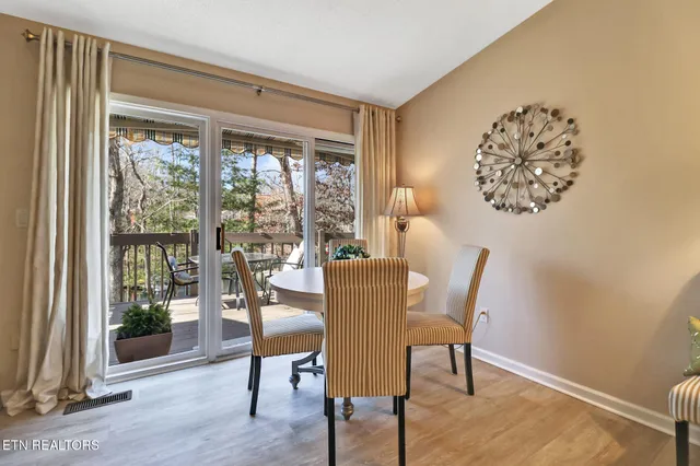 a bedroom with a bed and lamp