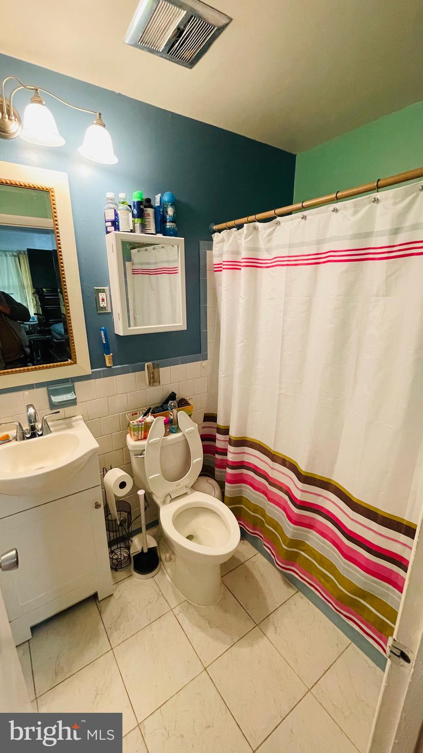 7207 Good Luck Road New Carrollton, MD 20784 - Photo 13 of 23 Primary Bedroom with Full Bathroom