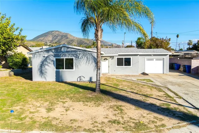 a view of a house with a swimming pool
