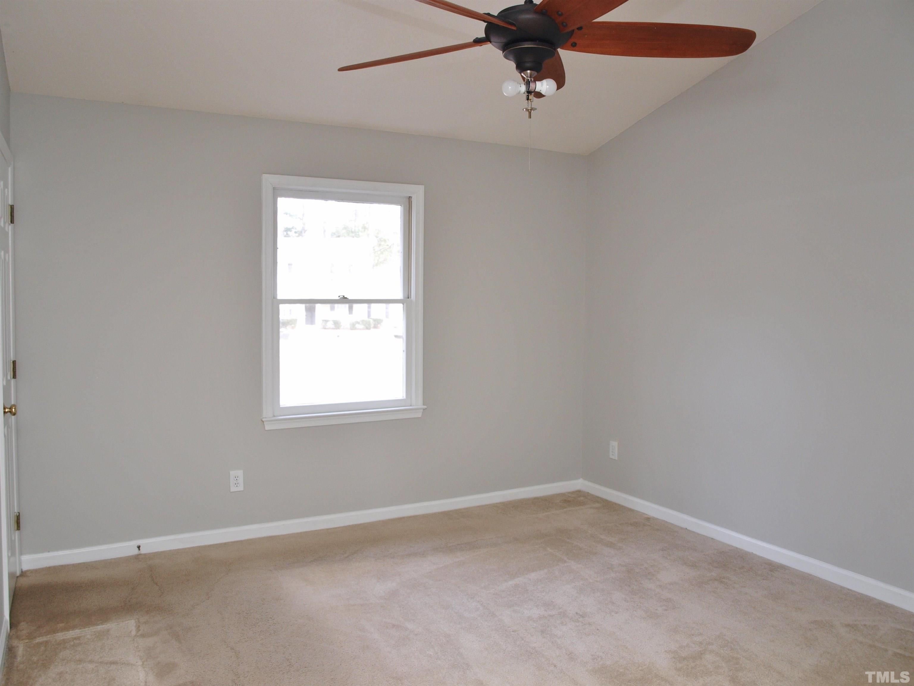4509 Lafferty Court Raleigh, NC 27616 - Photo 9 of 17 an empty room with a window