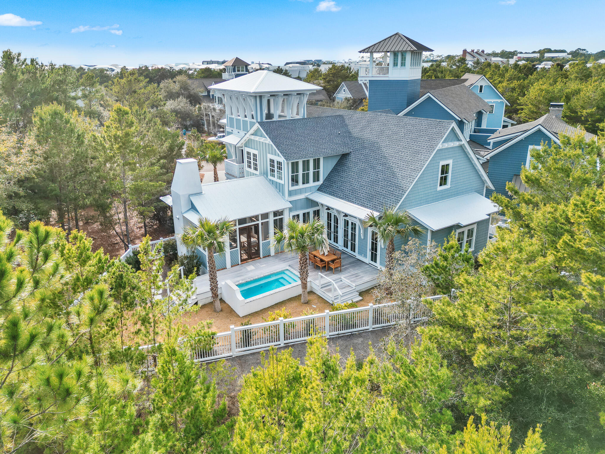 an aerial view of a house with a garden
