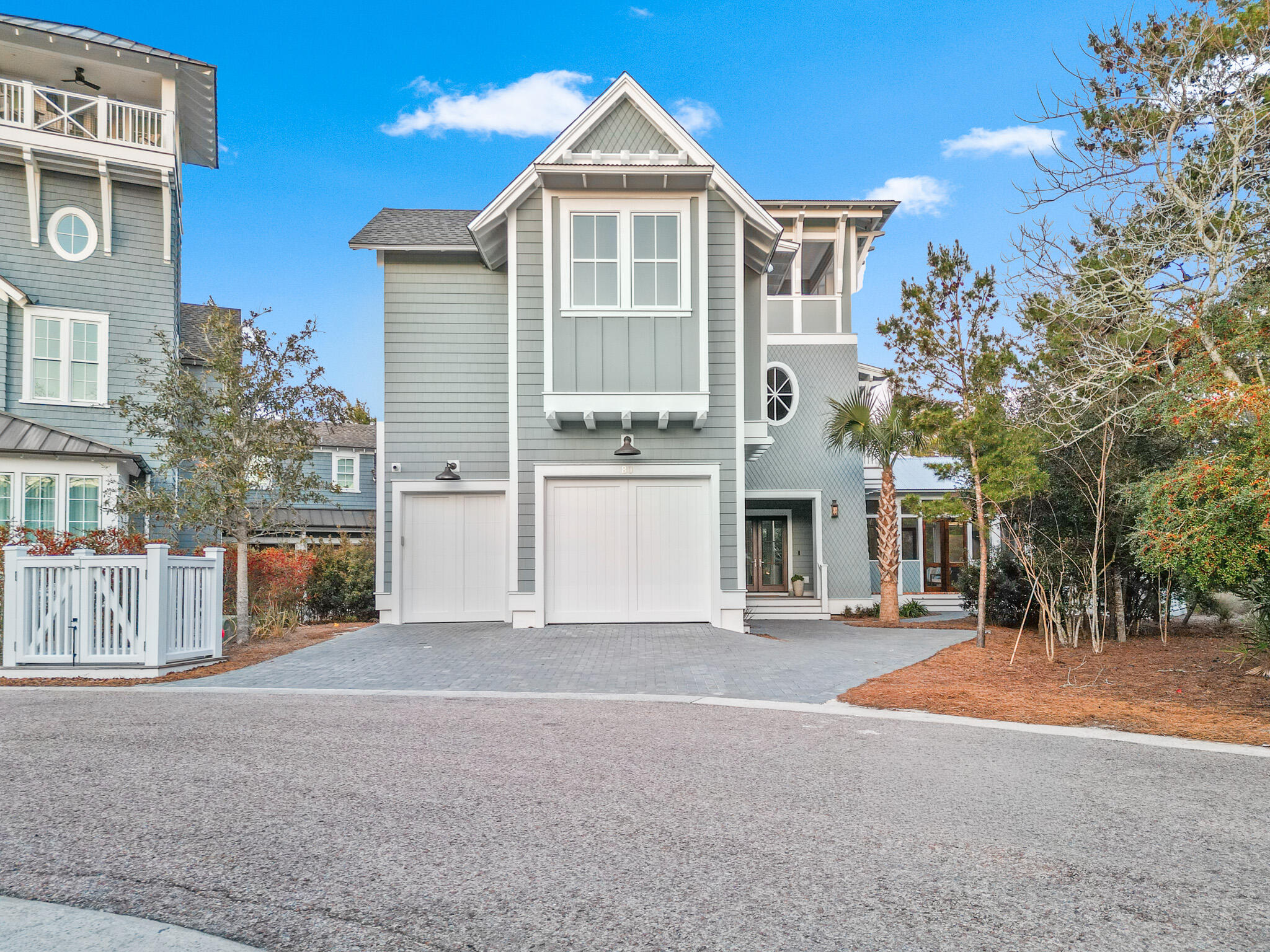 80 Shore Bridge Cir Inlet Beach Inlet Beach, FL 32461 - Photo 2 of 46 a front view of a house with a yard