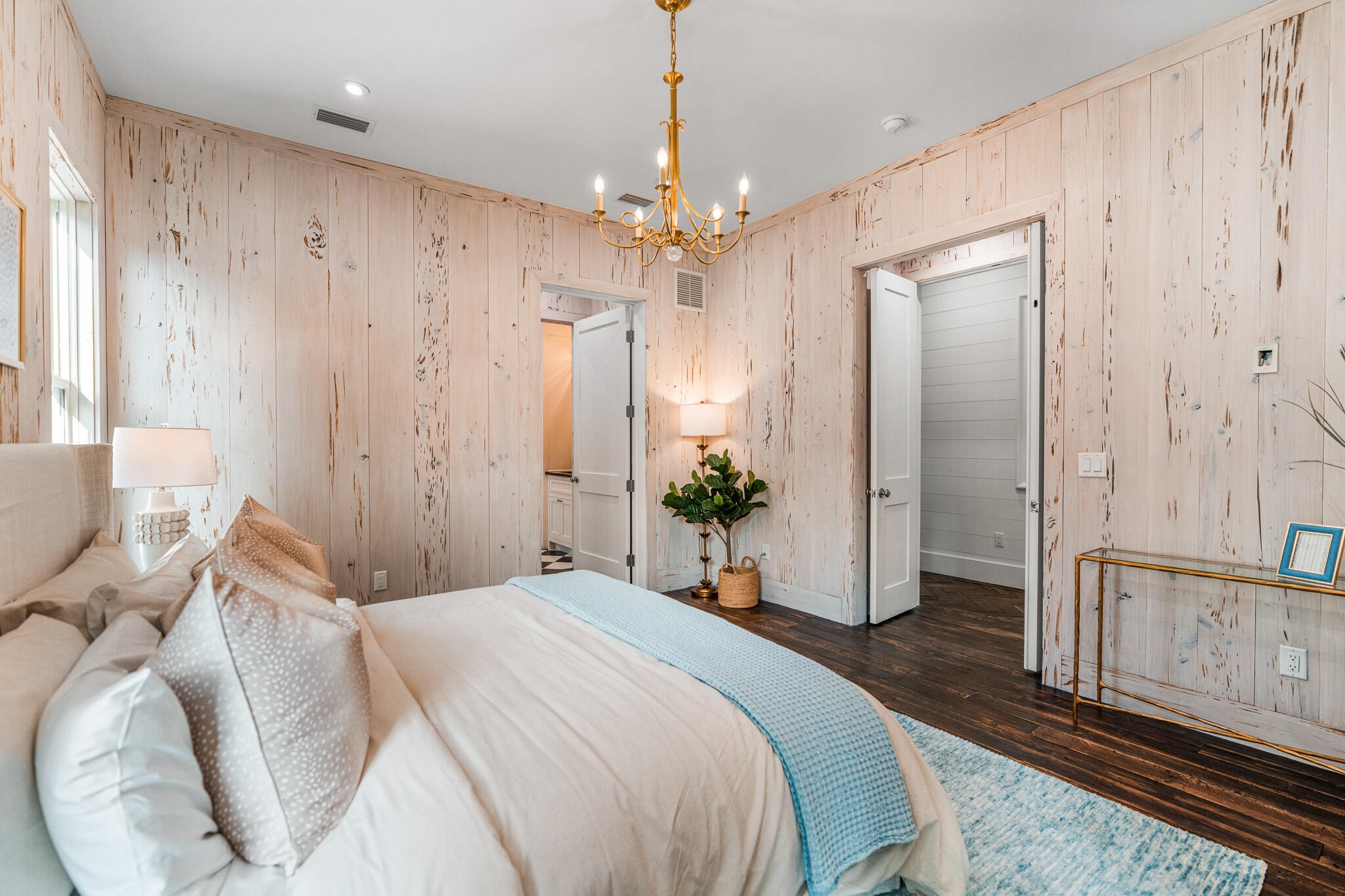 80 Shore Bridge Cir Inlet Beach Inlet Beach, FL 32461 - Photo 22 of 46 a spacious bedroom with a bed chandelier and a window