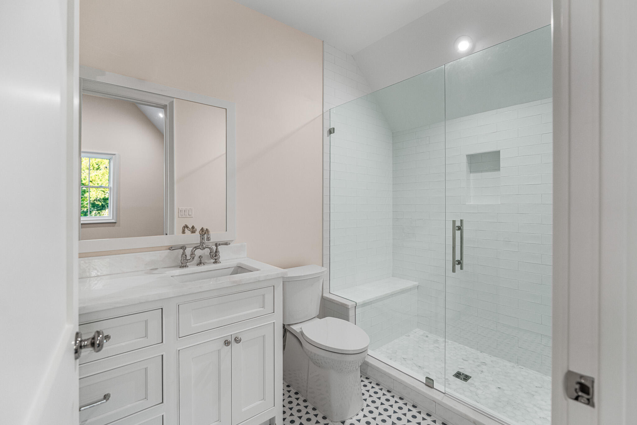80 Shore Bridge Cir Inlet Beach Inlet Beach, FL 32461 - Photo 29 of 46 a bathroom with a shower sink vanity mirror and toilet