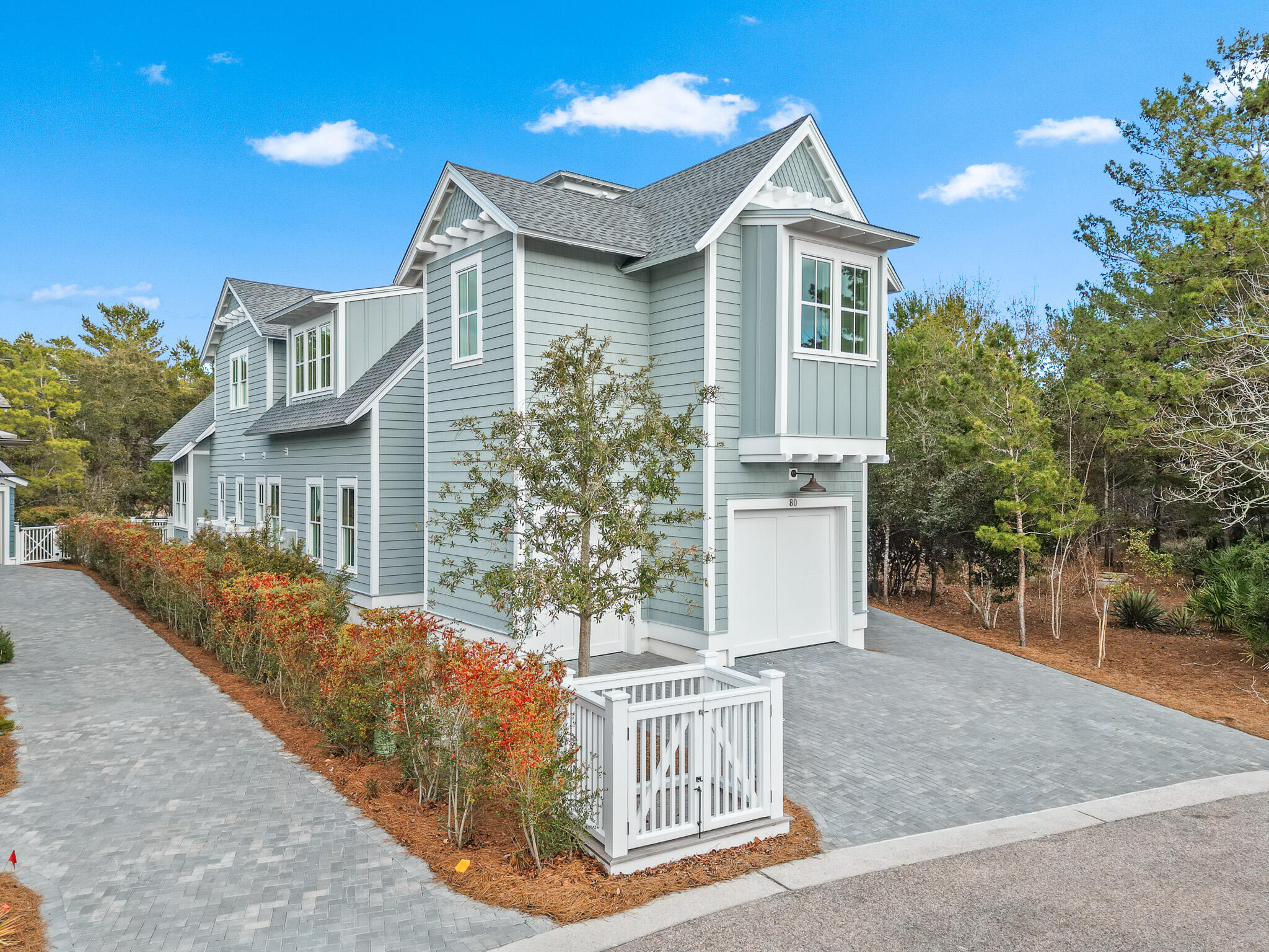 80 Shore Bridge Cir Inlet Beach Inlet Beach, FL 32461 - Photo 3 of 46 a front view of a house with a yard
