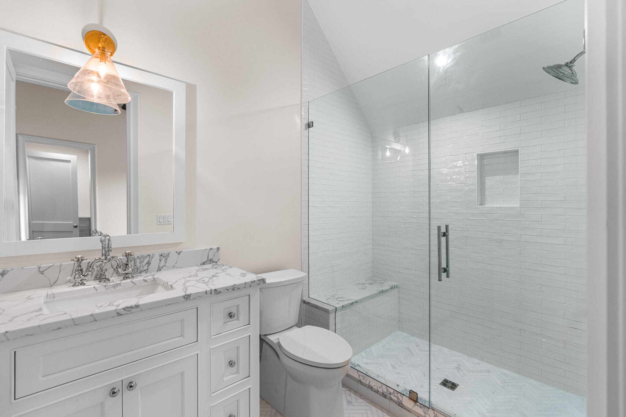 80 Shore Bridge Cir Inlet Beach Inlet Beach, FL 32461 - Photo 35 of 46 a bathroom with a shower sink vanity mirror and toilet