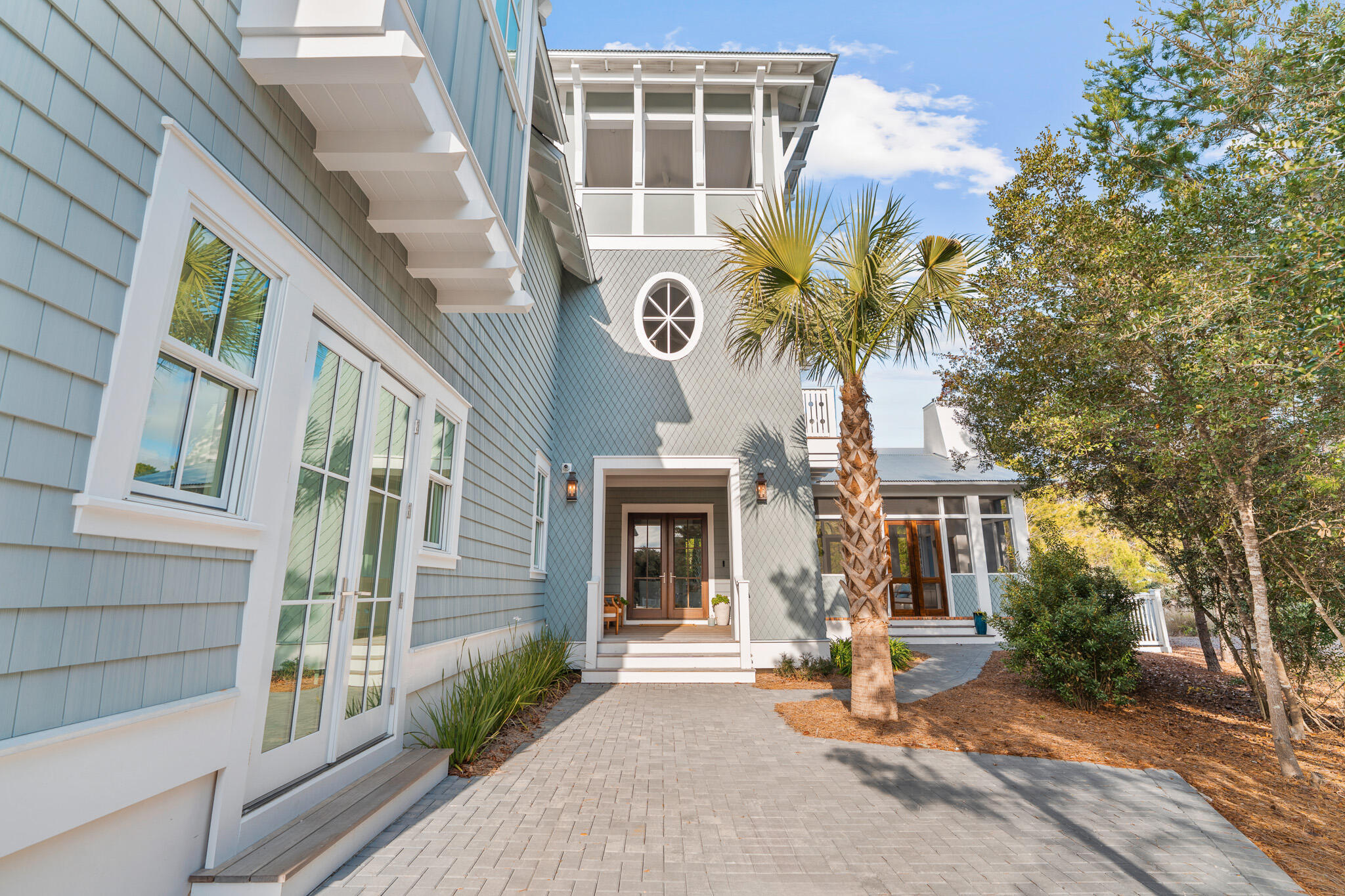 80 Shore Bridge Cir Inlet Beach Inlet Beach, FL 32461 - Photo 5 of 46 a view of a building with a tree in front