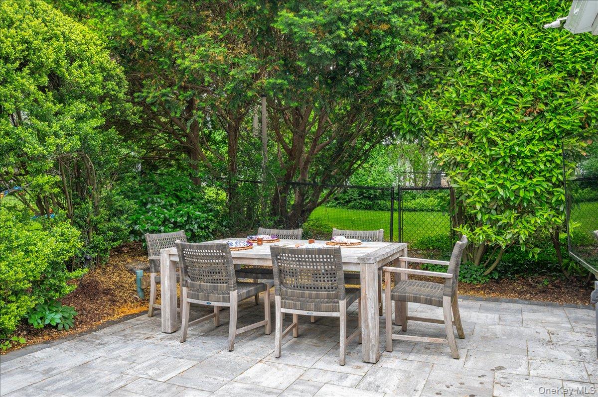 49 Eton Road Larchmont, NY 10538 - Photo 25 of 34 a view of an outdoor space with table and chairs