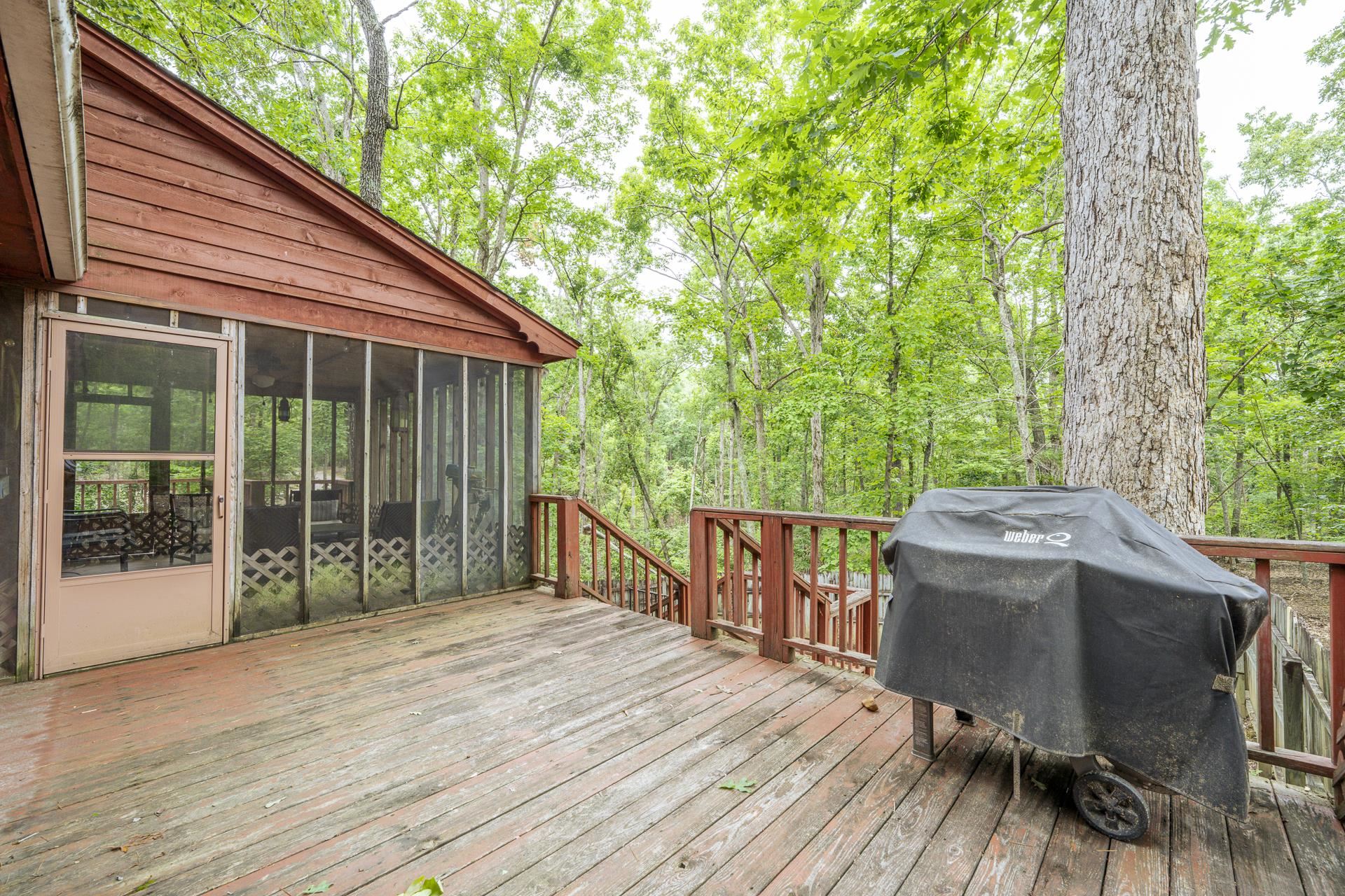 405 Murray Lane Counce, TN 38326 - Photo 4 of 36 a view of a wooden deck and a backyard