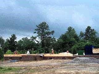 a view of a yard with an outdoor space