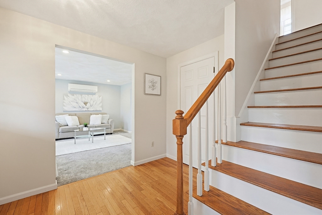 1 Edmund H Nichols Road North Attleboro, MA 02760 - Photo 20 of 39 a view of entryway and hall with wooden floor