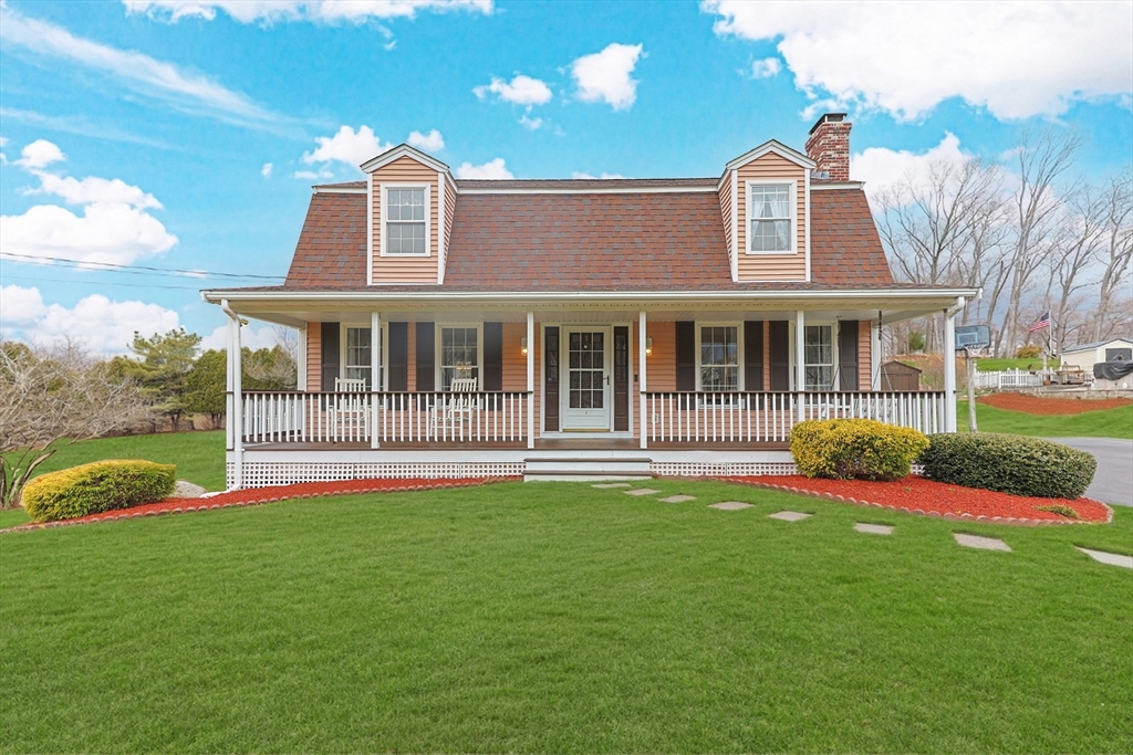 1 Edmund H Nichols Road North Attleboro, MA 02760 - Photo 2 of 39 a front view of a house with a yard and porch