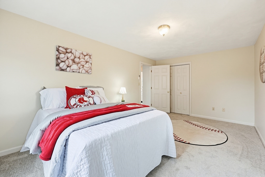 1 Edmund H Nichols Road North Attleboro, MA 02760 - Photo 24 of 39 a bedroom with a bed and a painting on the wall