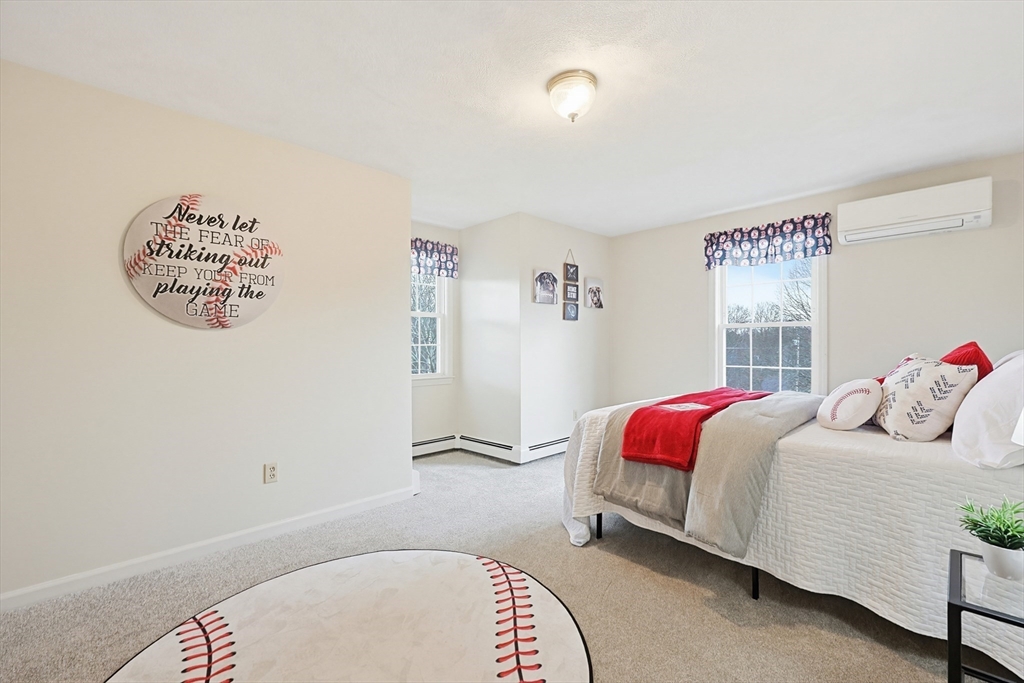 1 Edmund H Nichols Road North Attleboro, MA 02760 - Photo 25 of 39 a bedroom with a bed and a table