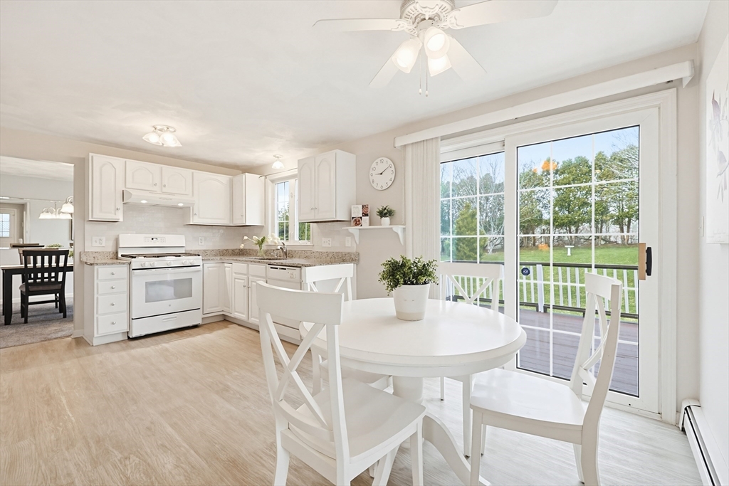 1 Edmund H Nichols Road North Attleboro, MA 02760 - Photo 7 of 39 a kitchen with white cabinets and white appliances