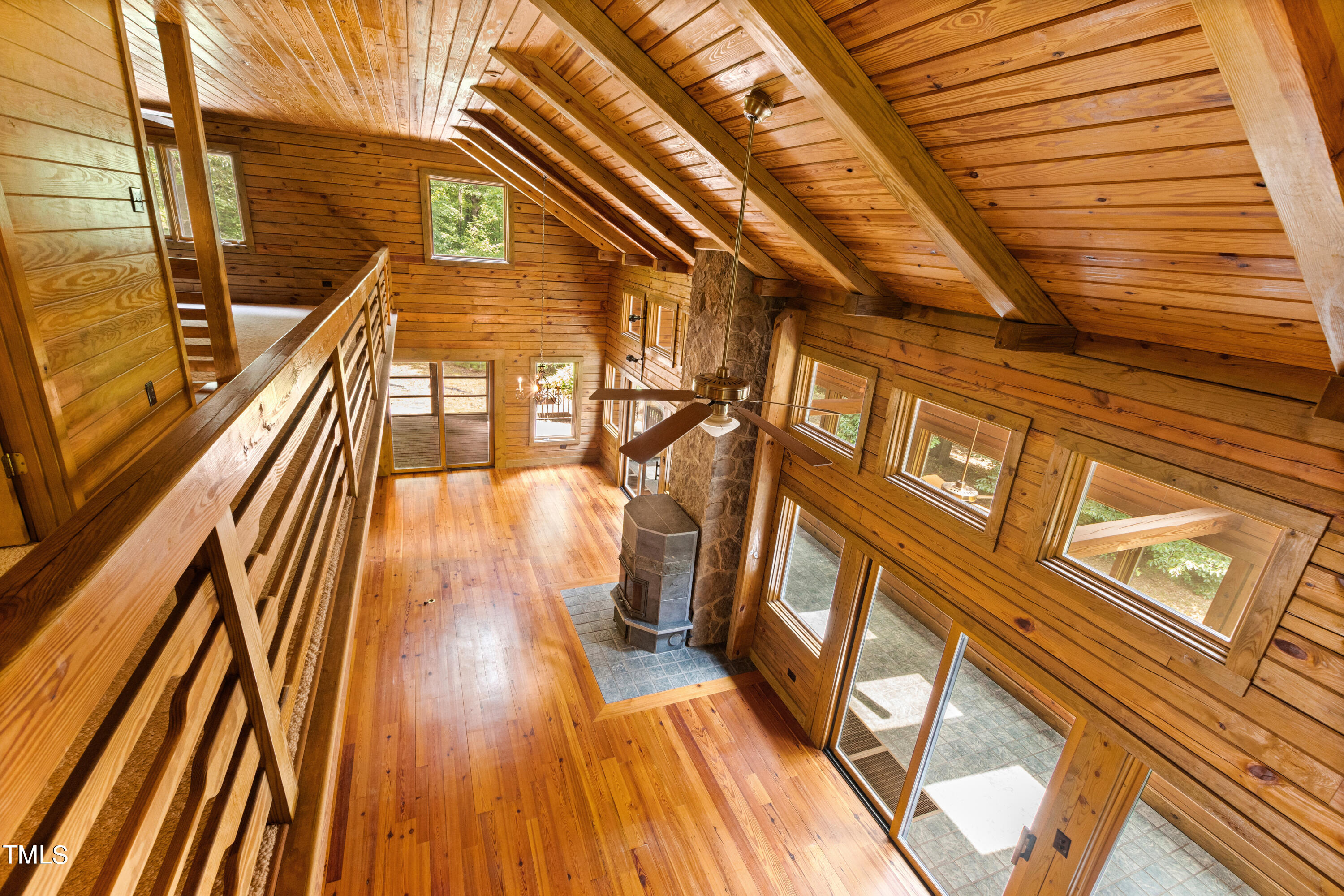 12944 Old Creedmoor Road Raleigh, NC 27613 - Photo 11 of 31 a view of a balcony with wooden floor