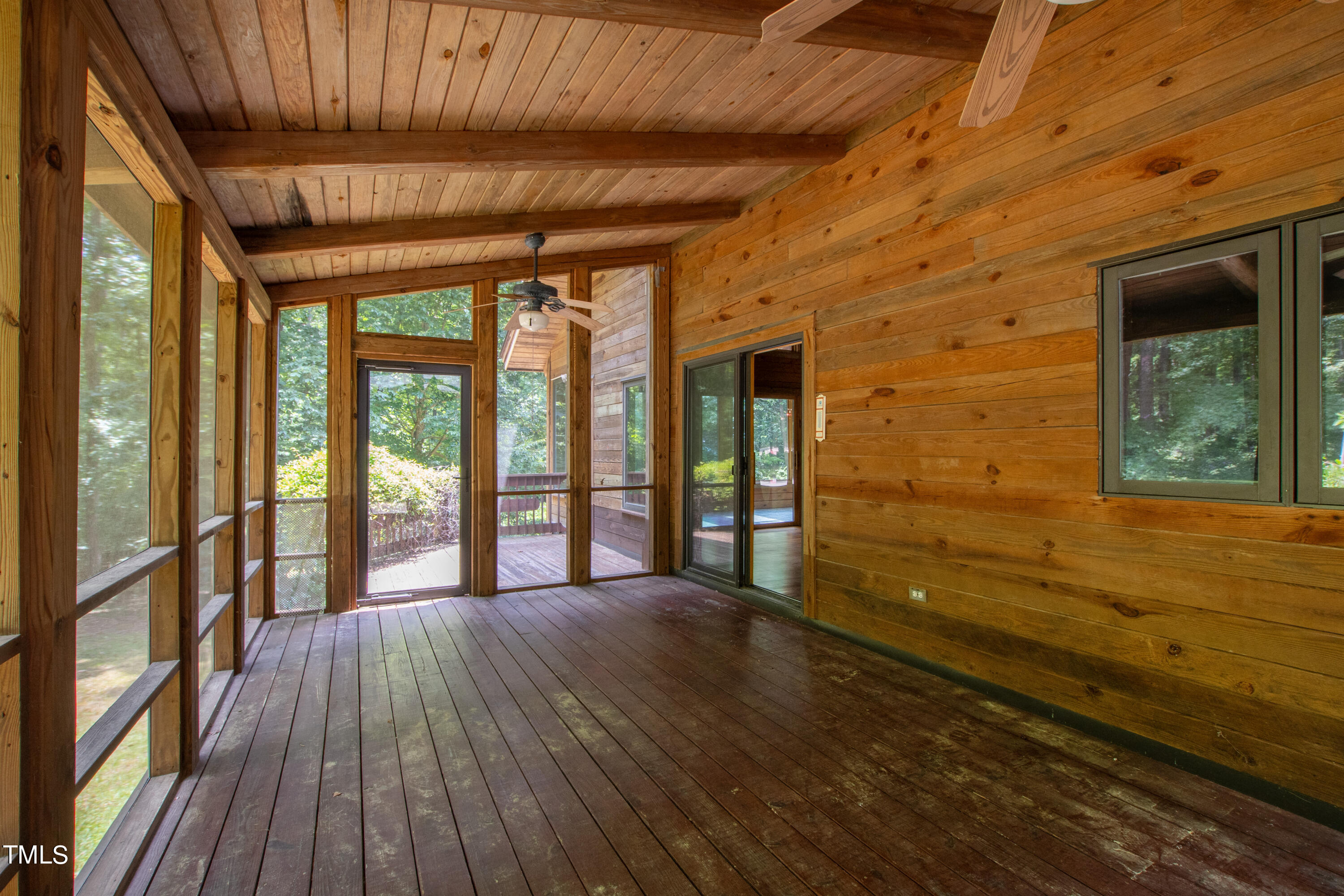12944 Old Creedmoor Road Raleigh, NC 27613 - Photo 24 of 31 a view of porch with wooden floor and outdoor space