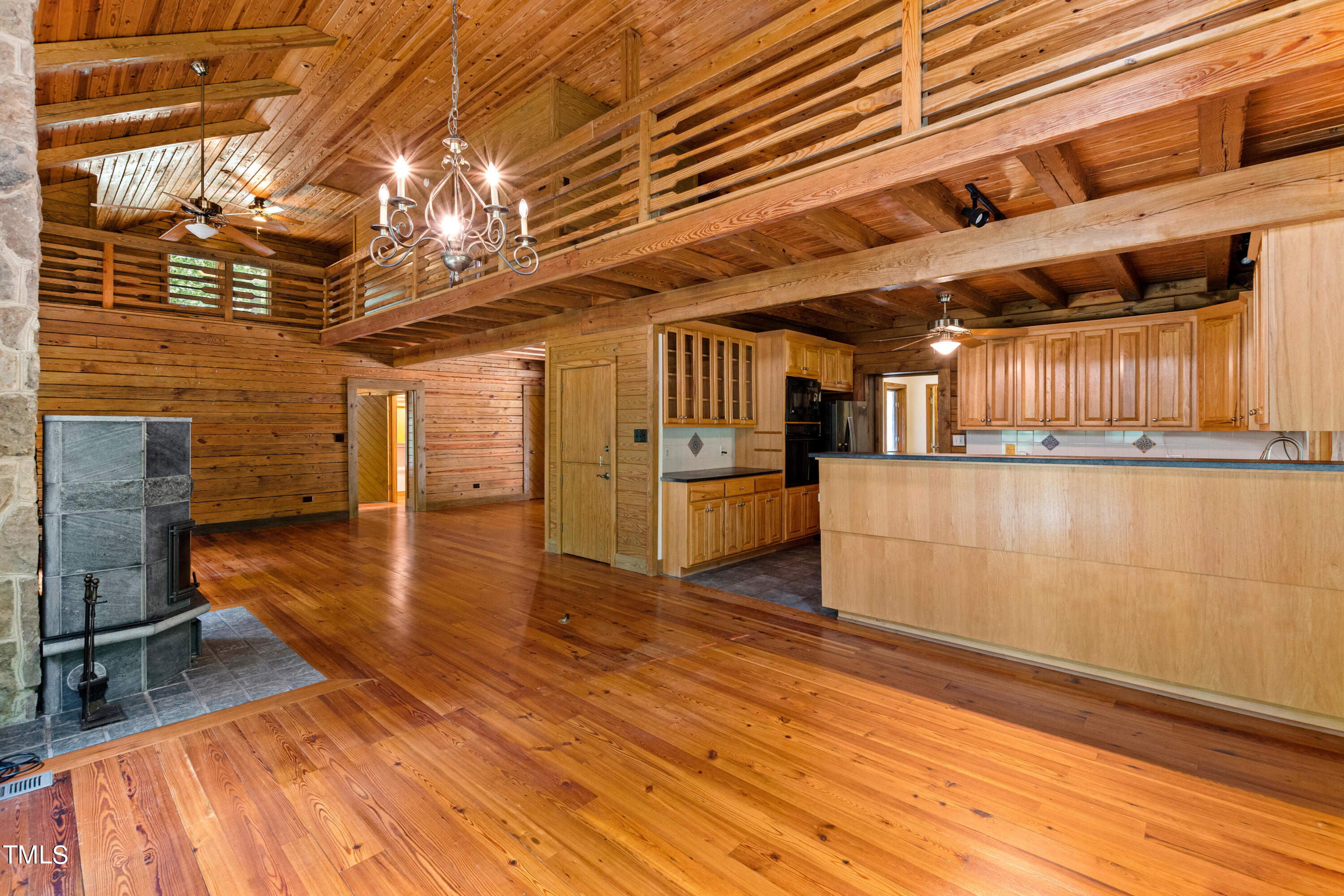 12944 Old Creedmoor Road Raleigh, NC 27613 - Photo 10 of 31 a view of a room with wooden floor