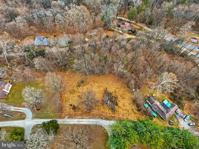 a view of houses with yard