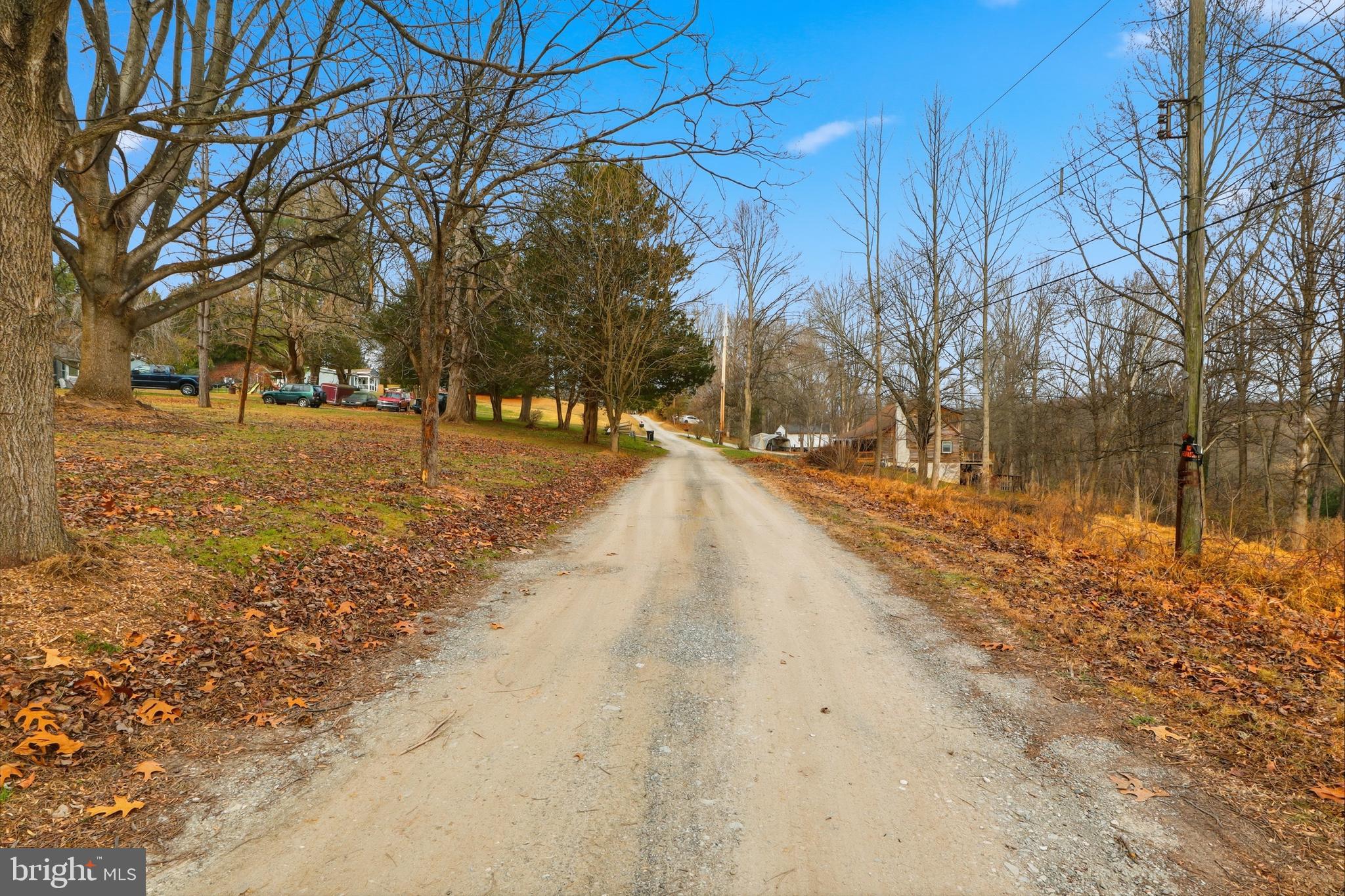 219 A Highfield Road Airville, PA 17302 - Photo 5 of 30 a street view with large trees