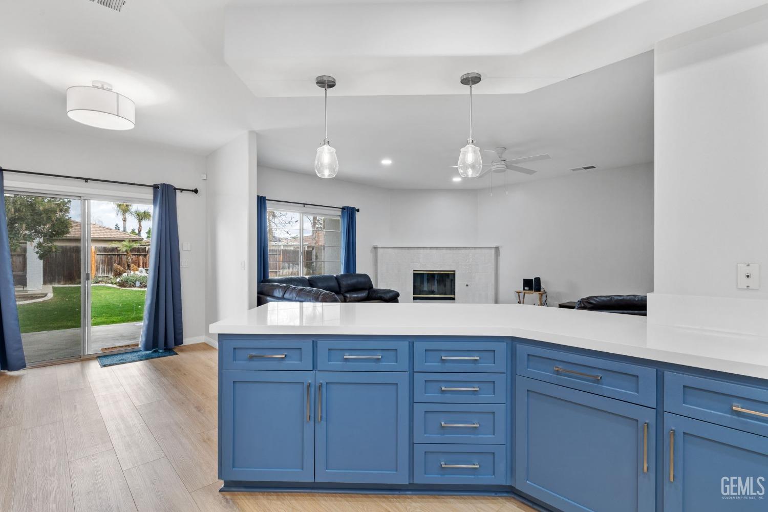 Undisclosed Address Bakersfield, CA 93312 - Photo 15 of 34 a spacious bathroom with a granite countertop sink a mirror and shower view