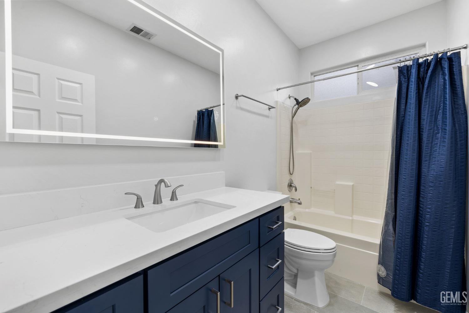 Undisclosed Address Bakersfield, CA 93312 - Photo 24 of 34 a bathroom with a sink a toilet and shower