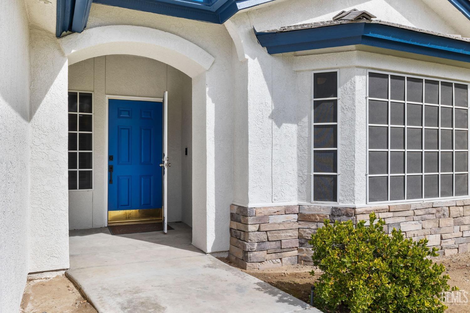 Undisclosed Address Bakersfield, CA 93312 - Photo 3 of 34 a view of front door of house