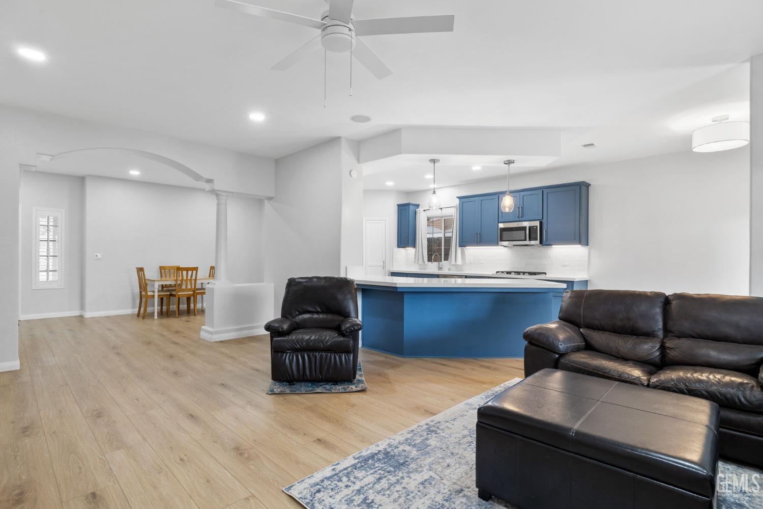 Undisclosed Address Bakersfield, CA 93312 - Photo 5 of 34 a living room with furniture and kitchen view