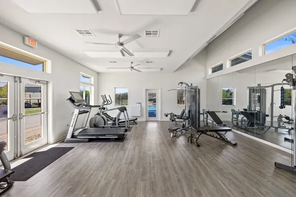 a view of a room with gym equipment