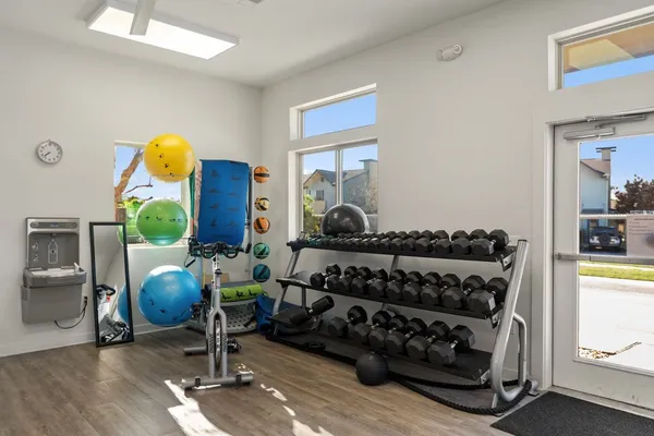 a living room with furniture and a table